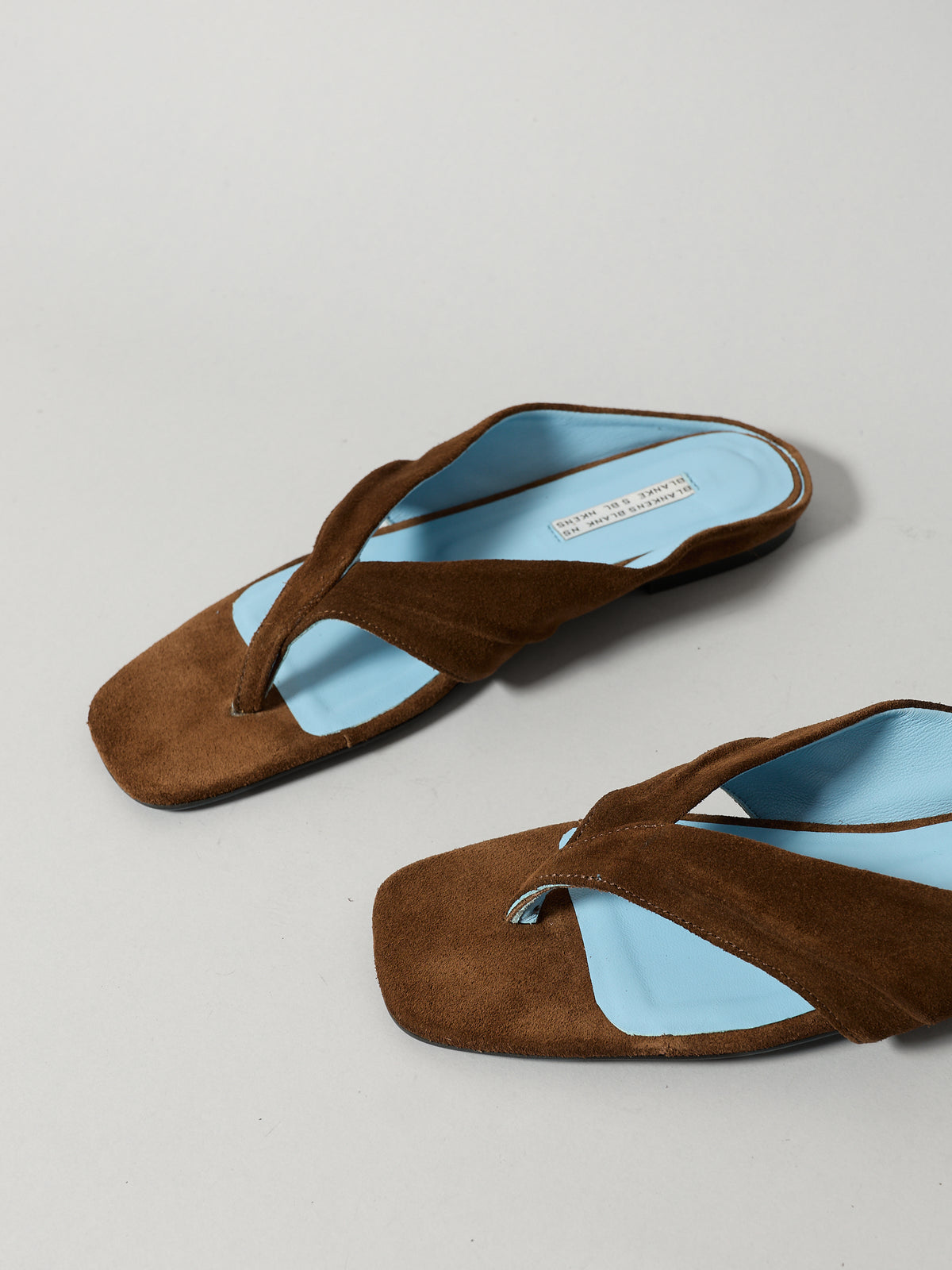 The Opal Brown Suede with Blue Leather Lining